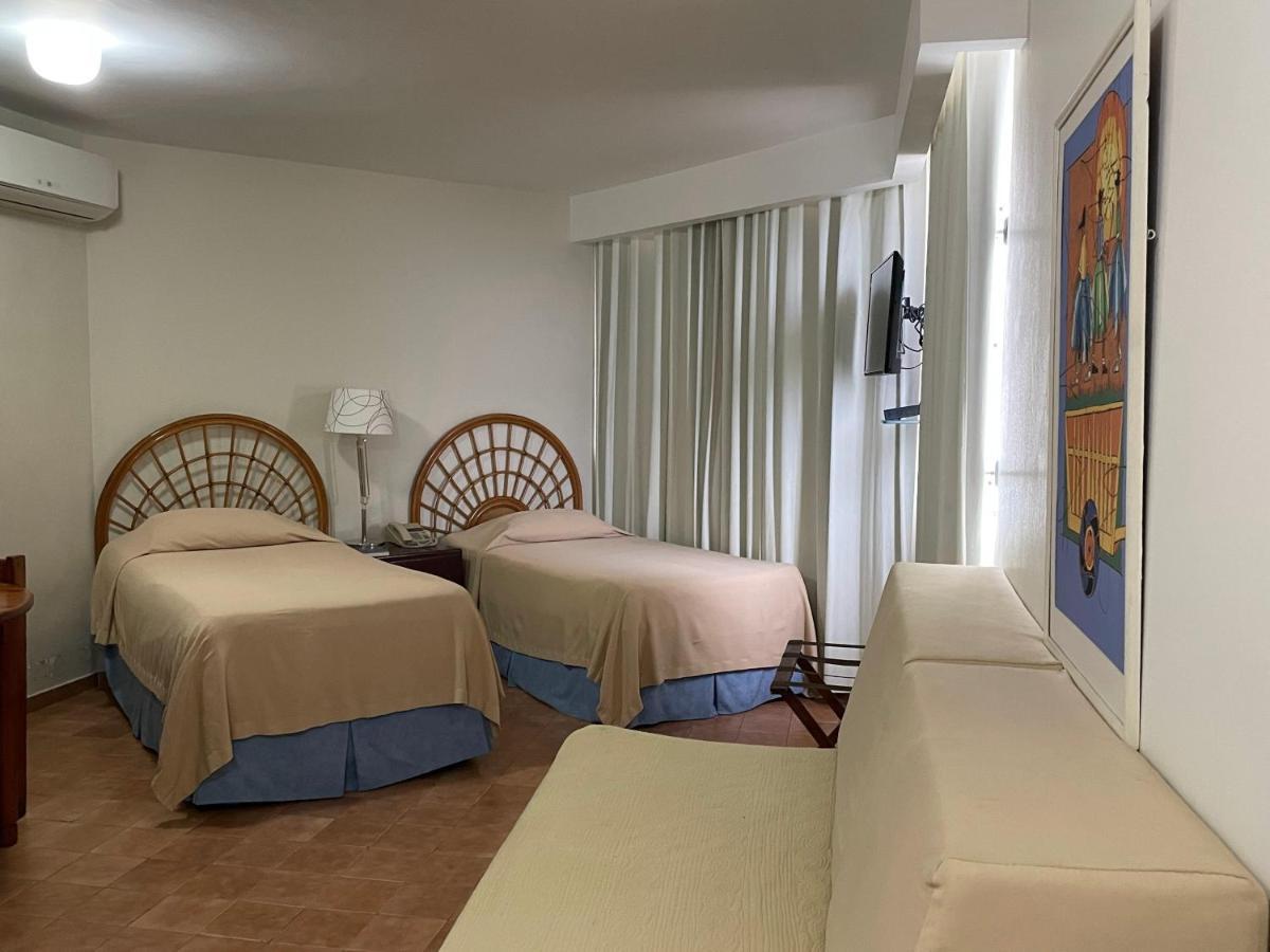 Aparta Hotel Plaza Del Sol Santo Domingo Bagian luar foto
