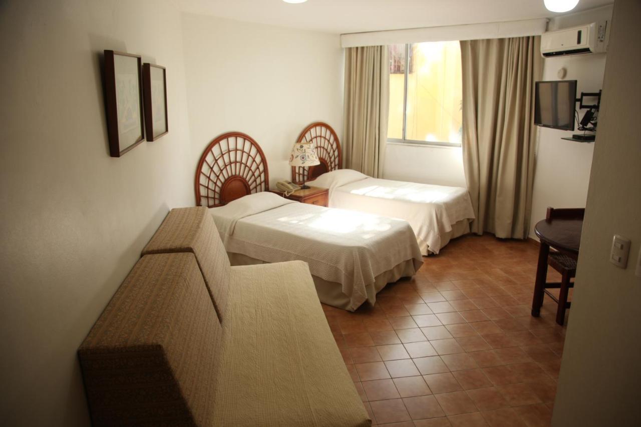 Aparta Hotel Plaza Del Sol Santo Domingo Bagian luar foto